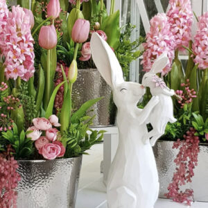 Hasenmutter mit kleinen Mädchen Hasen Blume
